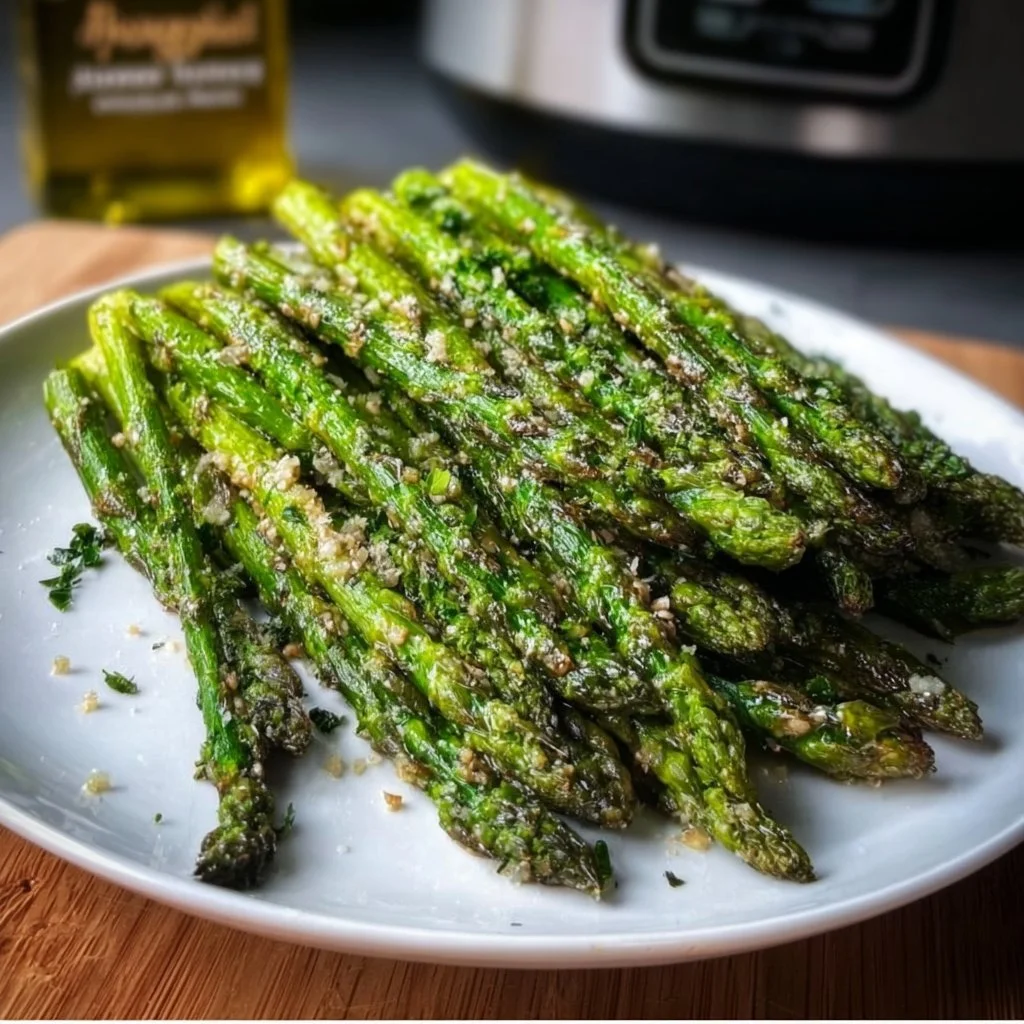 Delicious air fryer garlic butter asparagus served on a plate