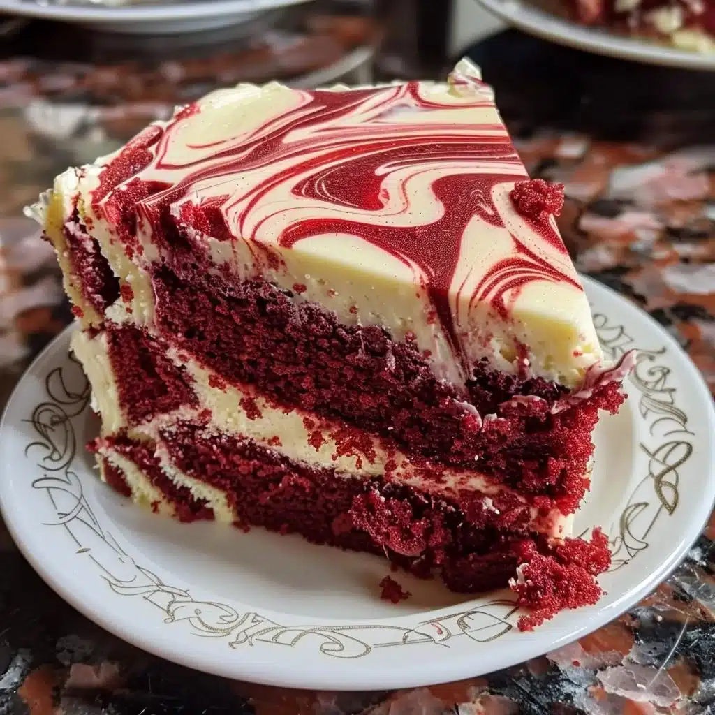 Delicious Red Velvet Cheesecake Swirl Cake topped with cream cheese frosting