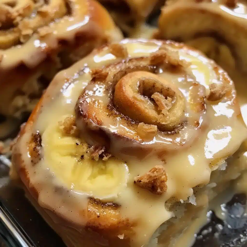 Delicious banana pudding cinnamon rolls with gooey vanilla pudding drizzle