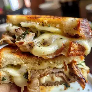 Delicious Porchetta Melt with juicy beef and gooey cheese